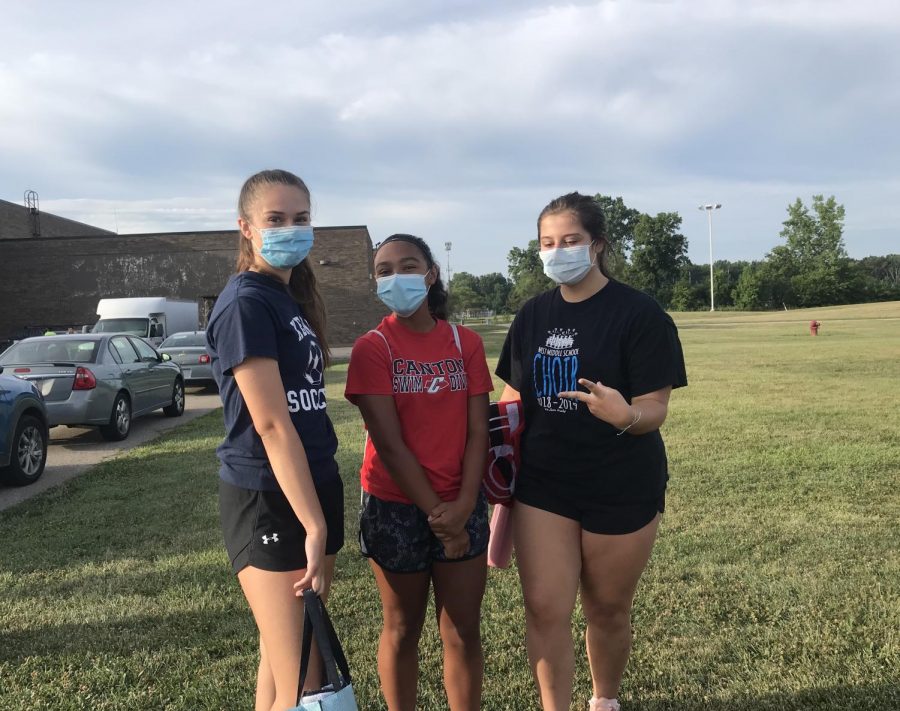 Canton Girls Swim and Dive members (left to right) Kaley VanSuch, Ava Martin and Maggie Francis arrive for summer conditioning.