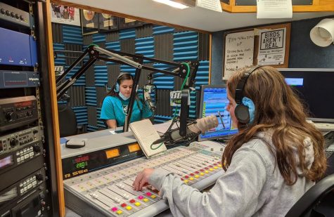 Madelyn Bajorek, Salem junior, and Lillian Menken, Salem senior, in 88.1 the Park’s main studio at Salem High School as they talk over the airwaves during November 2020’s Pledge Drive. 