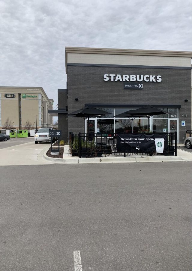 Customers+in+a+car+wait+in+the+drive-through+line+as+their+order+is+prepared+at+the+Starbucks+on+Merriman+Road+in+Romulus+on+a+Sunday+afternoon.