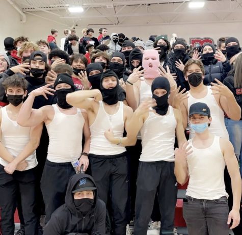 On Jan. 14, the Canton High School student section shows up at the Phase Three gym in the “Shiesty fit,” a costume inspired by Pooh Shiesty which includes a ski mask, black pants and a tank top, to support the Canton Chiefs Boys Basketball team