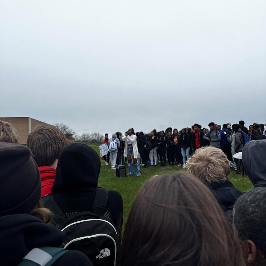 African-American+students+stand+on+a+hill+next+to+Salem+High+School%2C+overlooking+the+crowd+of+P-CEP+students+while+Precious+Floraday%2C+an+organizer+of+the+walkout%2C+leads+a+chant+of+%E2%80%9CEnough+is+enough.%E2%80%9D+P-CEP+campus%2C+April+15%2C+2022.+