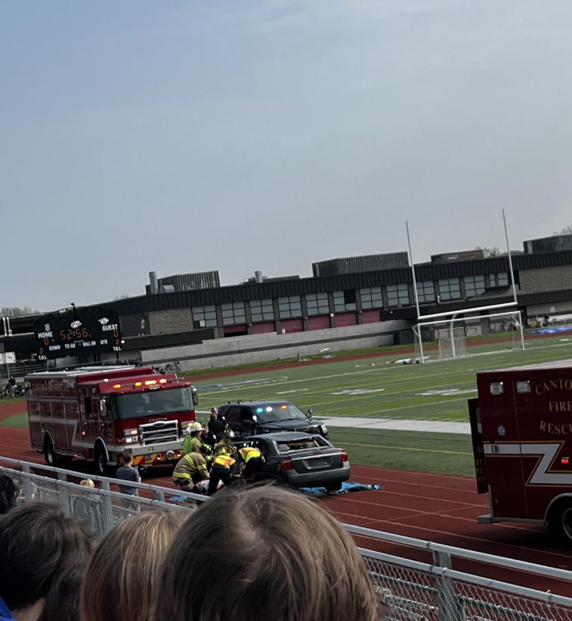 The+Canton+Fire+Department+removes+a+student+actor+from+a+destroyed+car+located+in+the+P-CEP+East+Turf+Stadium.+May+11%2C+2022.+
