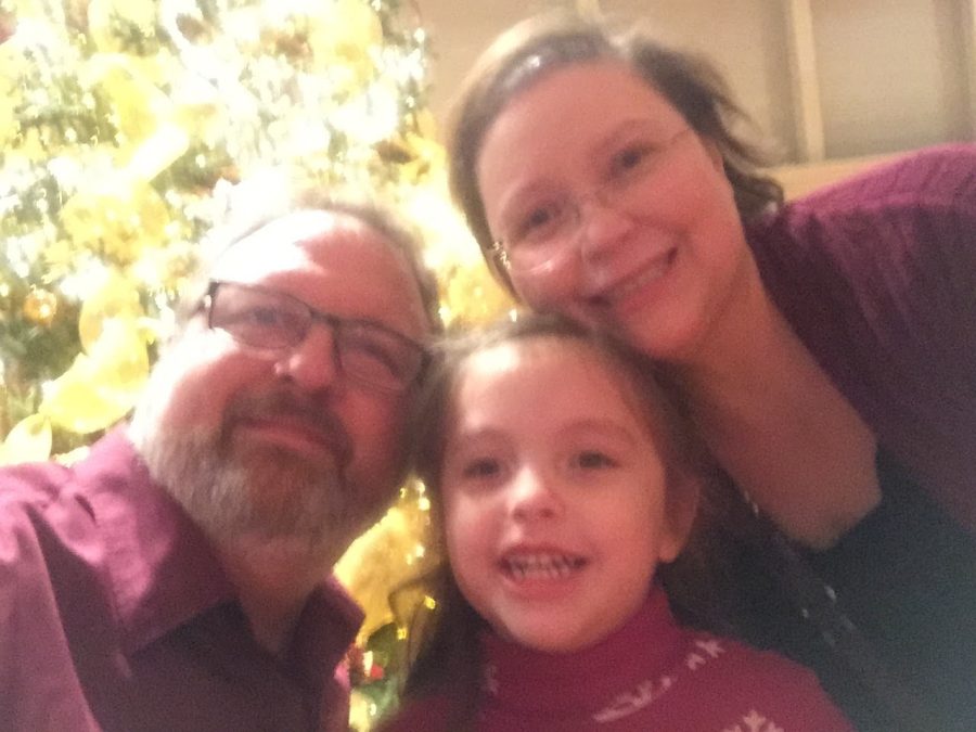 Dale Palmer (left), takes a selfie with his wife, Norma Palmer (right), and his daughter, Sofia Palmer (middle). 