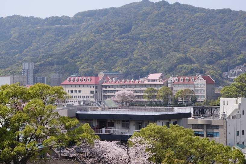 Kwassui+Junior+%26+Senior+High+School+in+Nagasaki+City%2C+Japan%2C+sits+atop+a+hill.+June+30%2C+2022.+