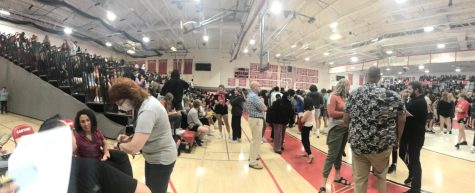Students gather in the Canton High School Phase 3 gymnasium after being evacuated from Salem High School. September 19, 2022. 