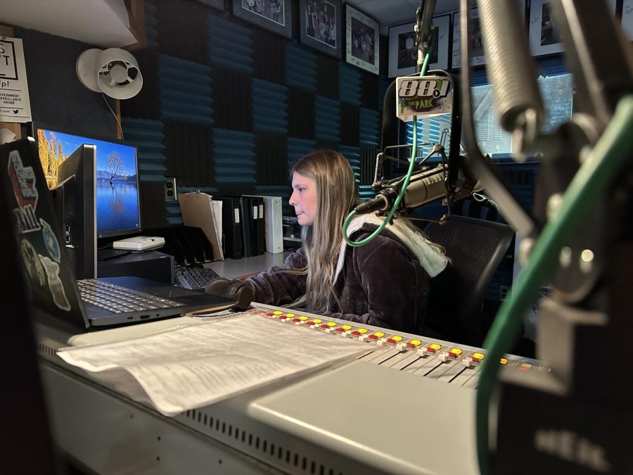 Ariel Ooms, Plymouth senior, installs a new queue into 88.1 The Park’s ENCO DAD system to provide fresh music and promos. December 5, 2022.