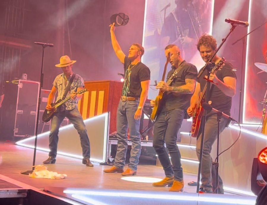 Parker McCollum (middle left) tips his hat to the sold-out crowd alongside band guitarists Brady Beal (left), Will Knaak (middle right) and Alex Weeden (right) during the last song of the night, an unreleased “Hurricane” which is set to be on McCollum’s upcoming album. February 3, 2023.