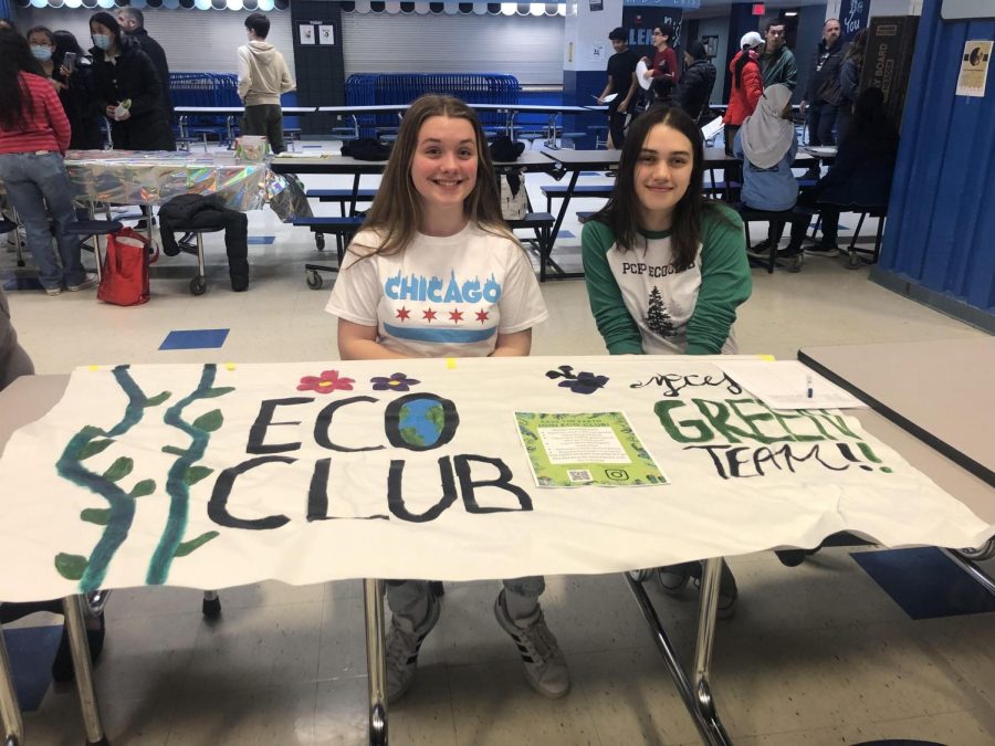 Shelby Dergis, Canton sophomore, and Jaspreet Kaur, Salem senior, provide future students with information on the Eco Club. March 22, 2023. 