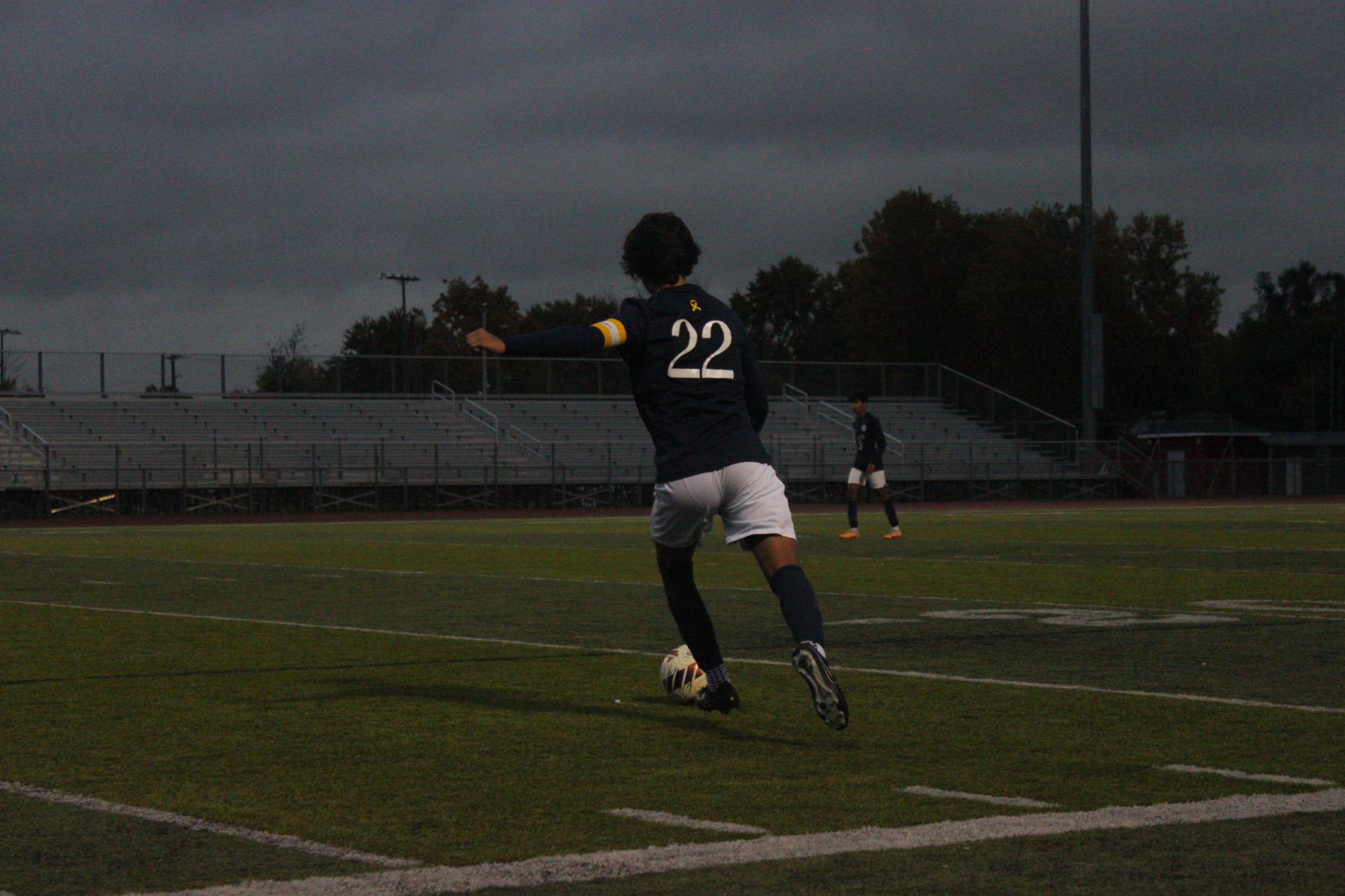 Senior Bennett Quijano takes a shot on net durning a free kick. Oct. 23, 2023. 