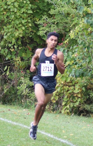 Senior Anirudh Krishnan nears the finish line at the Wayne County Cross Country Championship. Oct. 7, 2023.