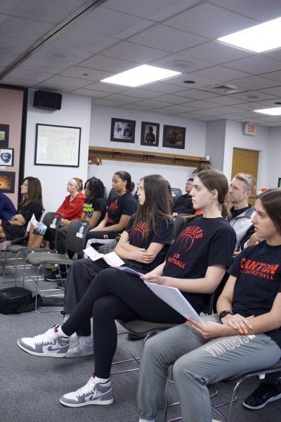 Players on the Canton Girls Varsity Basketball team sit and listen to citizens comments at the April 16 Board of Education meeting