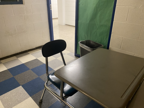 A student sits empty in a classroom upstairs at Salem High School due to absence. May 22, 2024.