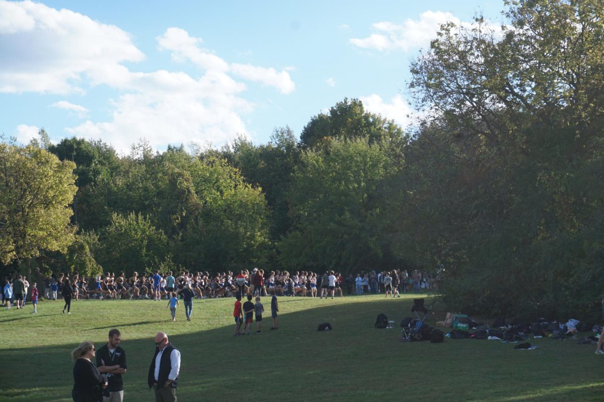 Salem Boys Cross-Country team and Plymouth Boys Cross-Country team take off on the Cass Benton Park course at final meet of the season. Oct. 8, 2024.