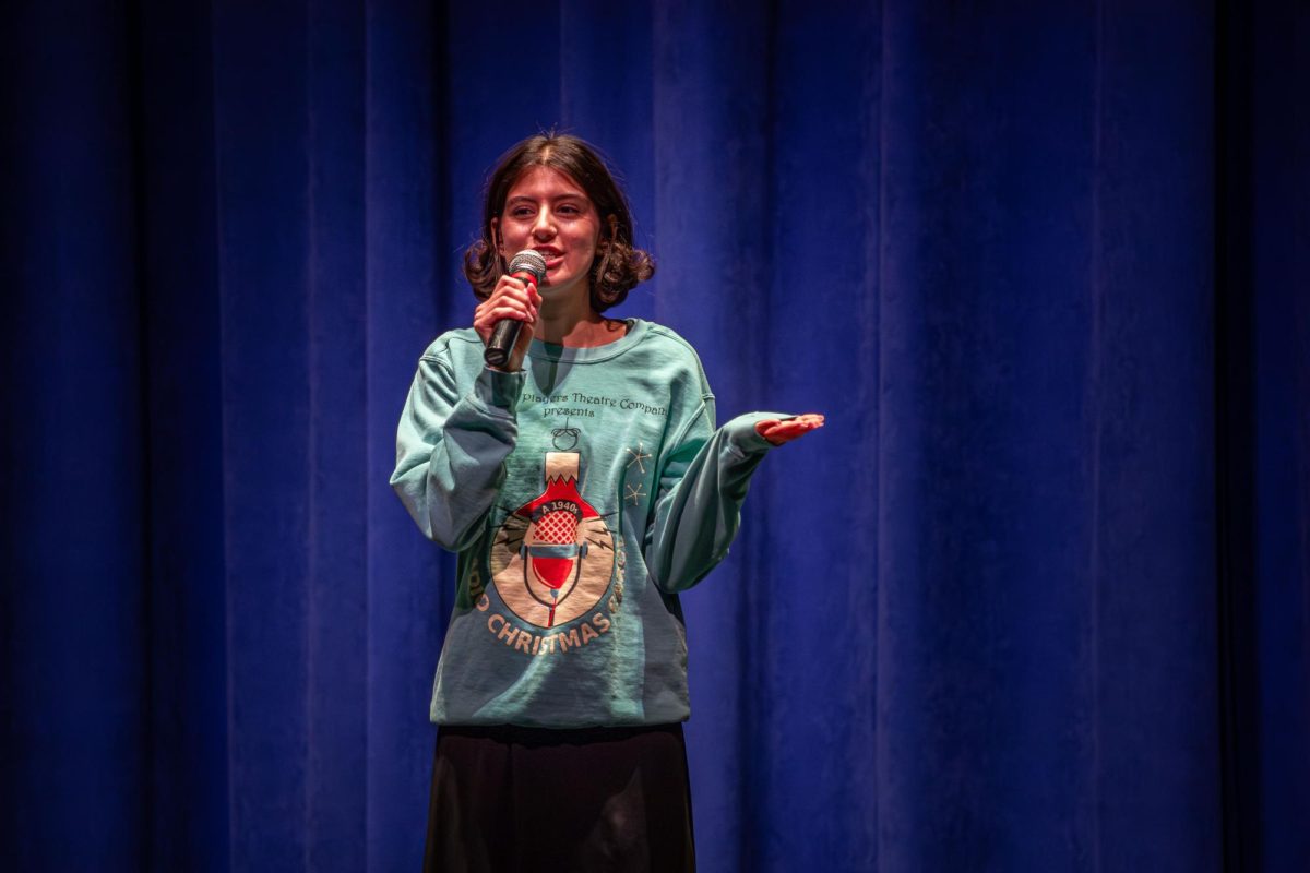 Canton senior Niveen Desrosiers promotes The Park Players Theater Company at the Collage Concert held in the Gloria Logan Auditorium at Salem High School, Feb. 5, 2025.