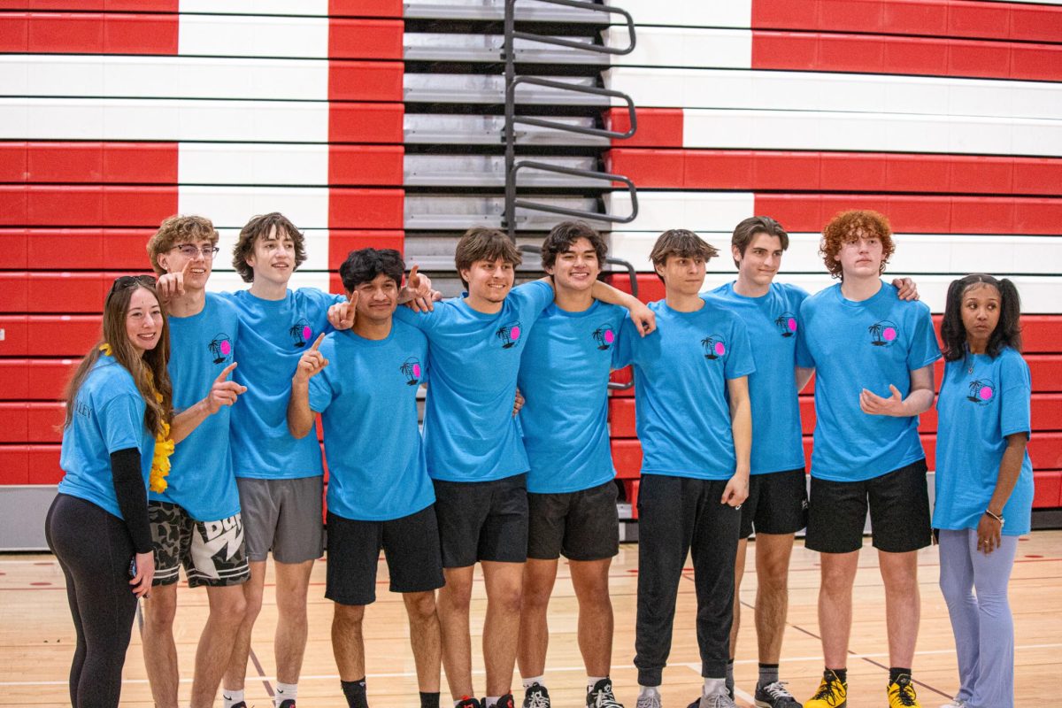 Sets on the beach pose for pictures after winning the Powderbuff Tournament, March 7,2025.