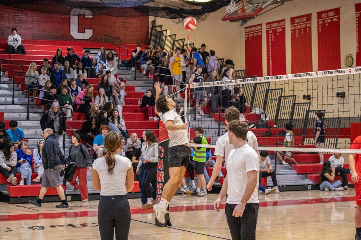 Canton senior Bruno Delgado jumps to spike a volleyball, March 7, 2025.