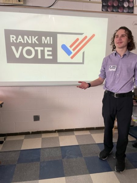 RJ Doroshewitz, Rank MI Vote volunteer, presents the prospect of Rank Choice Voting to the Introduction to Journalism Class. February 21, 2025.