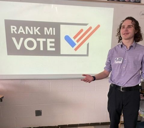 RJ Doroshewitz, Rank MI Vote volunteer, presents the prospect of Rank Choice Voting to the Introduction to Journalism Class. February 21, 2025.