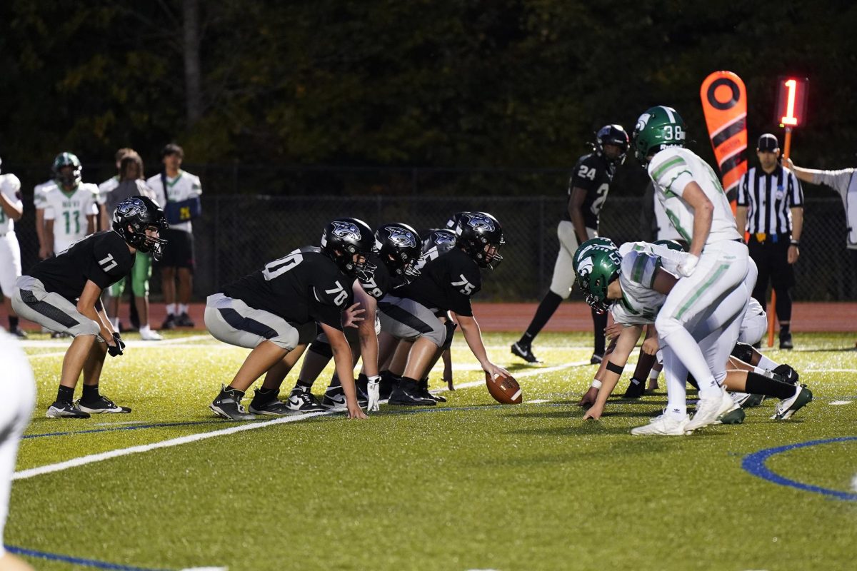 The Plymouth offense lines up with sophomore center and captain, Charlie Dziadzio, in the lead.
Sept. 25, 2025.