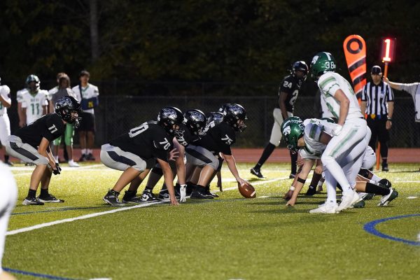 The Plymouth offense lines up with sophomore center and captain, Charlie Dziadzio, in the lead.
Sept. 25, 2025.