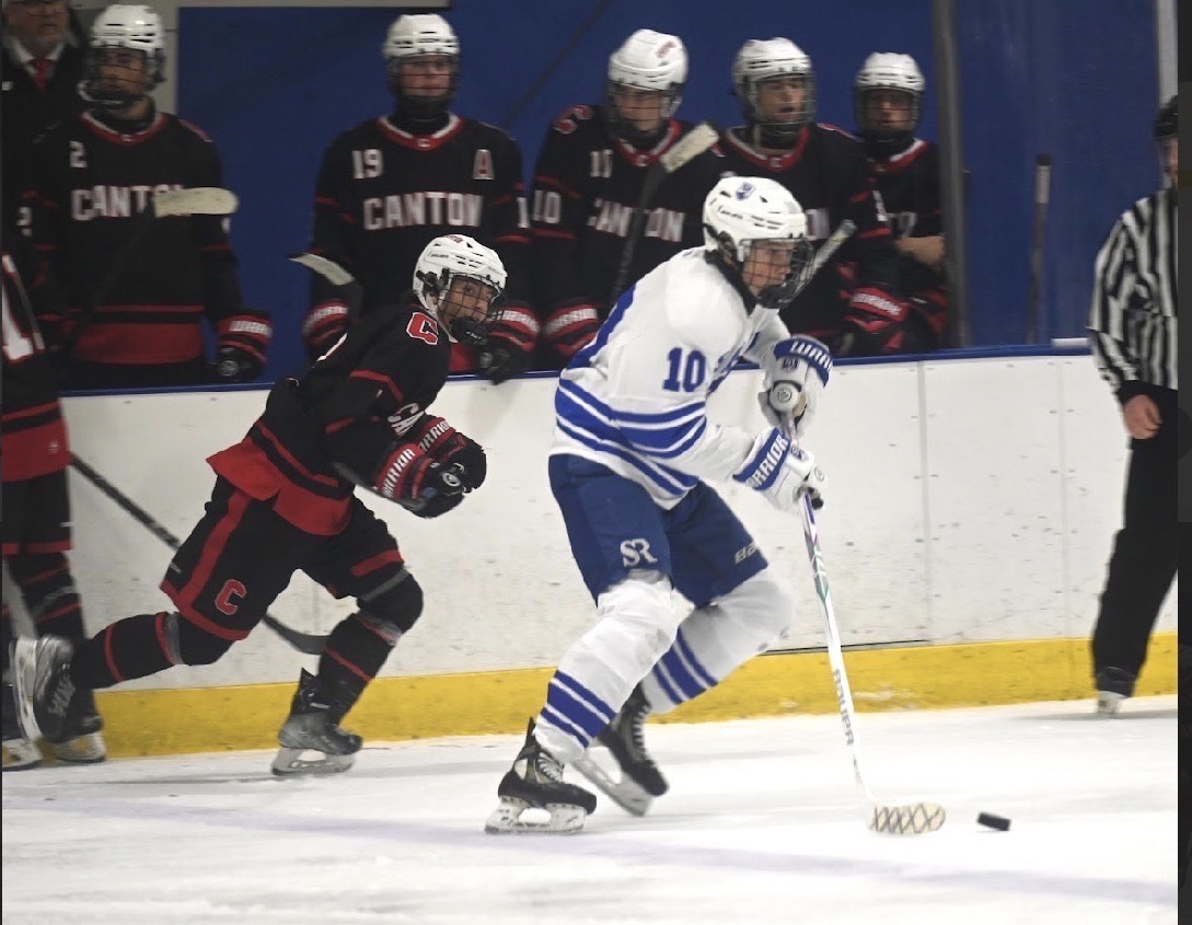 Salem senior Jack Baffy moves the puck along the ice during a game against Canton. Nov. 15, 2025. 