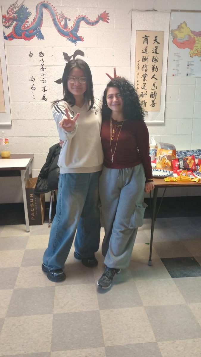 Salem junior Jennifer Chen (left), and Salem senior Jana Ayesh (right) participate in hot pot in Li Zhang’s Canton class. February 4, 2026.