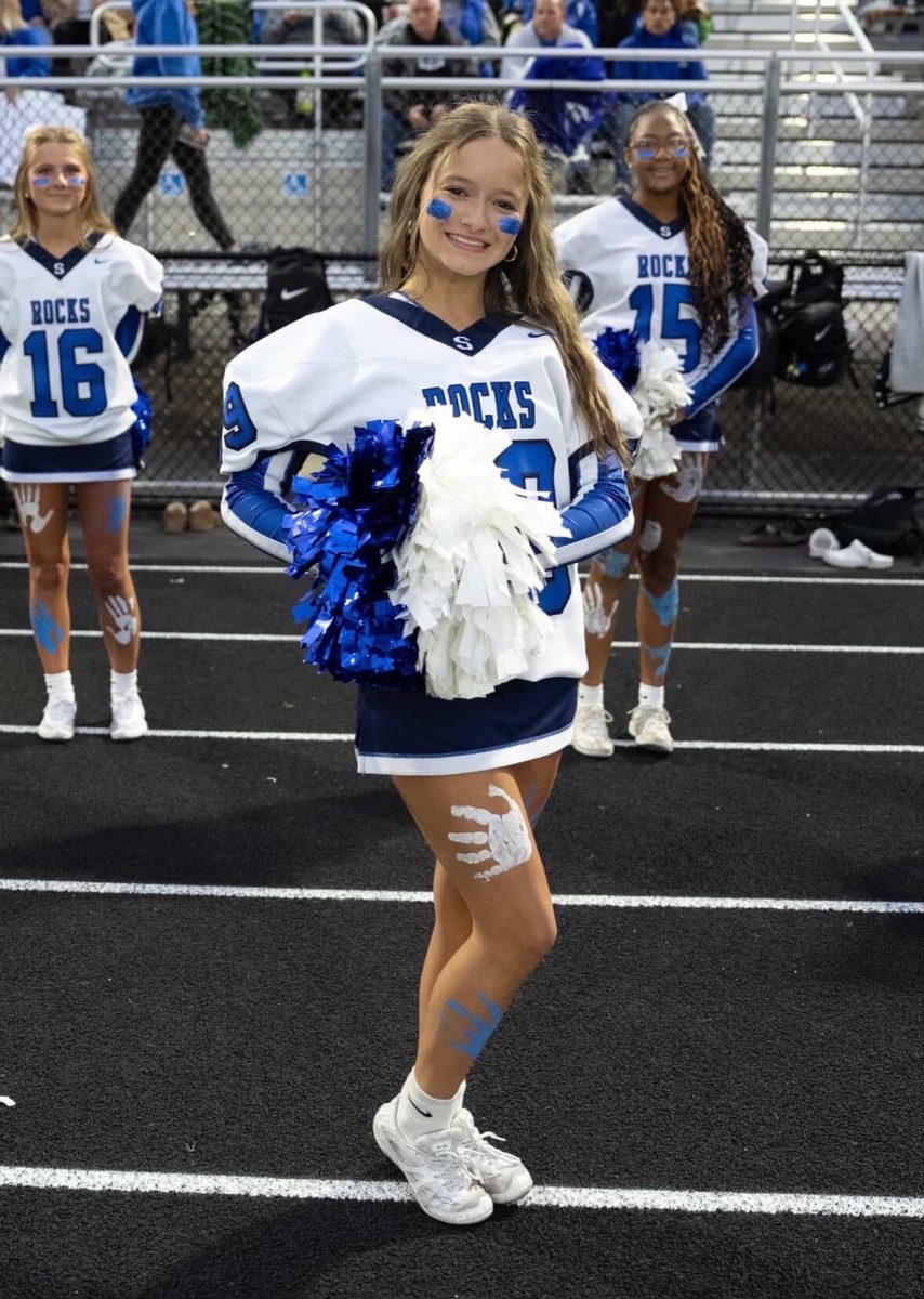 Stella Wroblewski cheers during the Salem Homecoming football game against Brighton. Oct. 10, 2025. 
