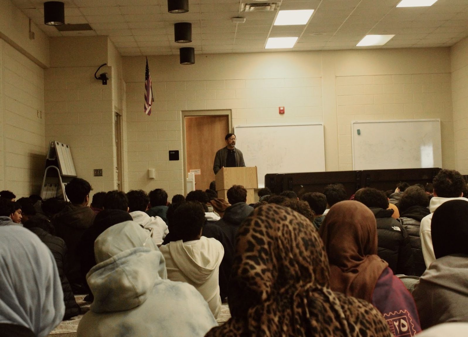 Students from the Muslim Student Association club gather in Plymouth to listen to Imam Haaris Ahmad, president of the Muslim Community of Western Suburbs Mosque, to talk about the importance of the last 10 days of Ramdan. March 13, 2026. 