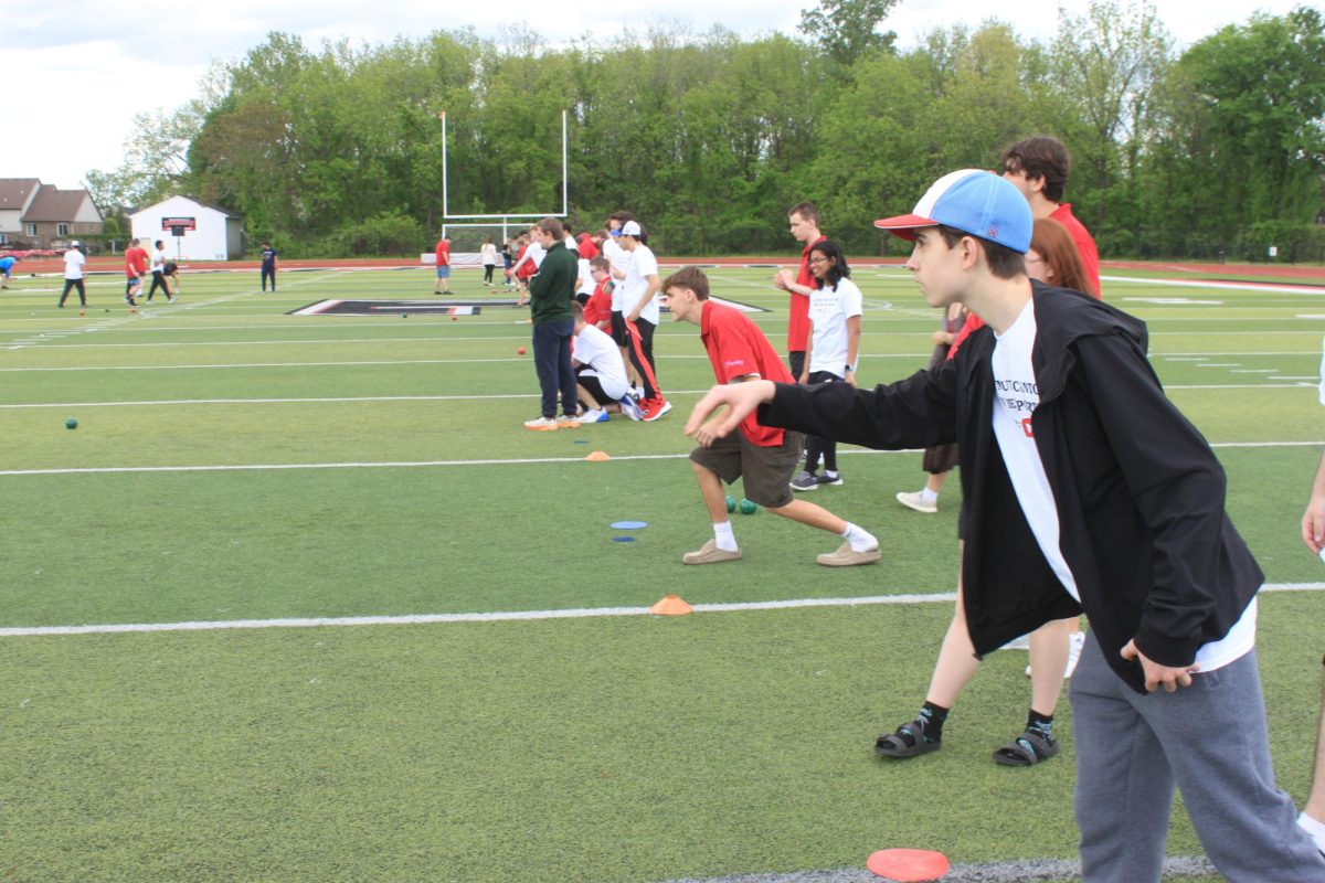 P-CEP Unified Athlete throws bocce ball towards pallino at the Churchill match in Livonia. May 20, 2026.